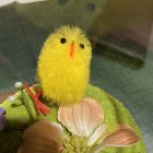 Whimsical yellow owl with foliage and roses on starry backdrop