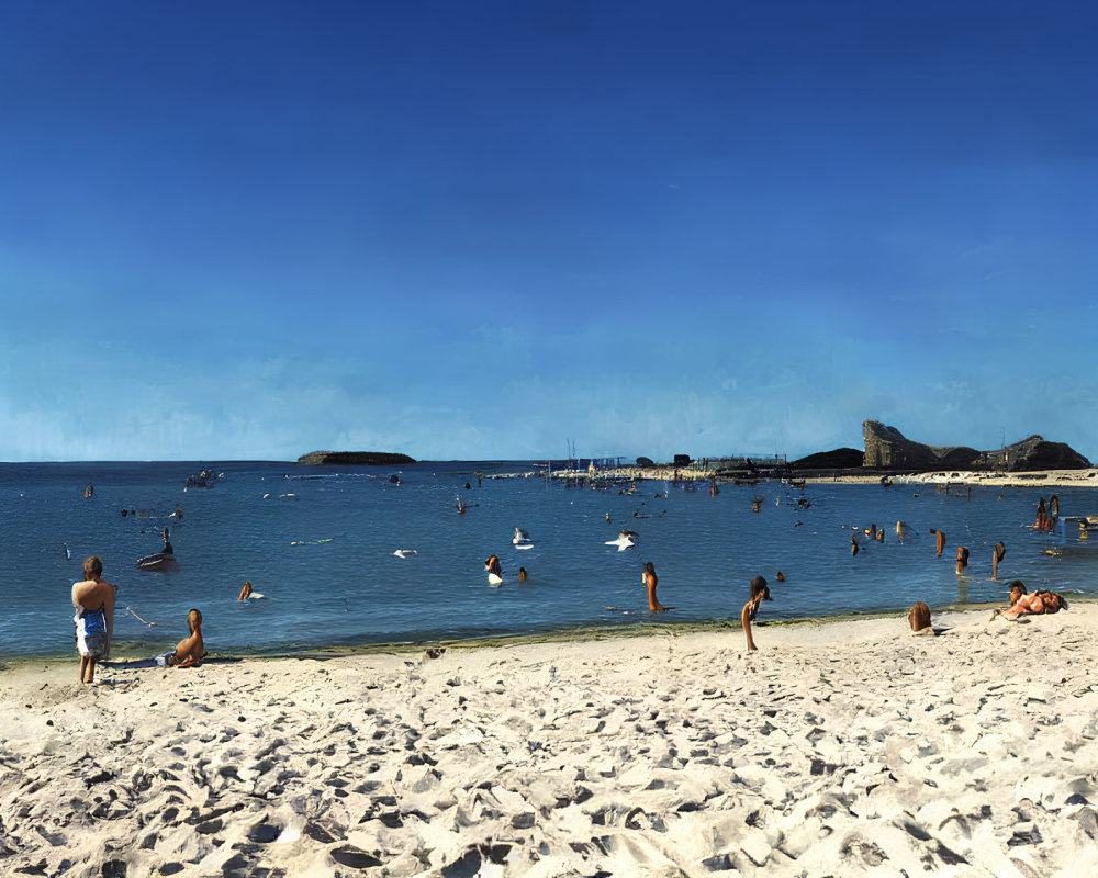 Sunny beach scene with people swimming and lounging on sand