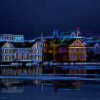 Historic buildings reflected in calm lake under starry sky.