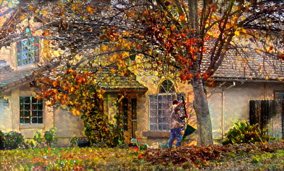 Man Raking Leaves in Autumn