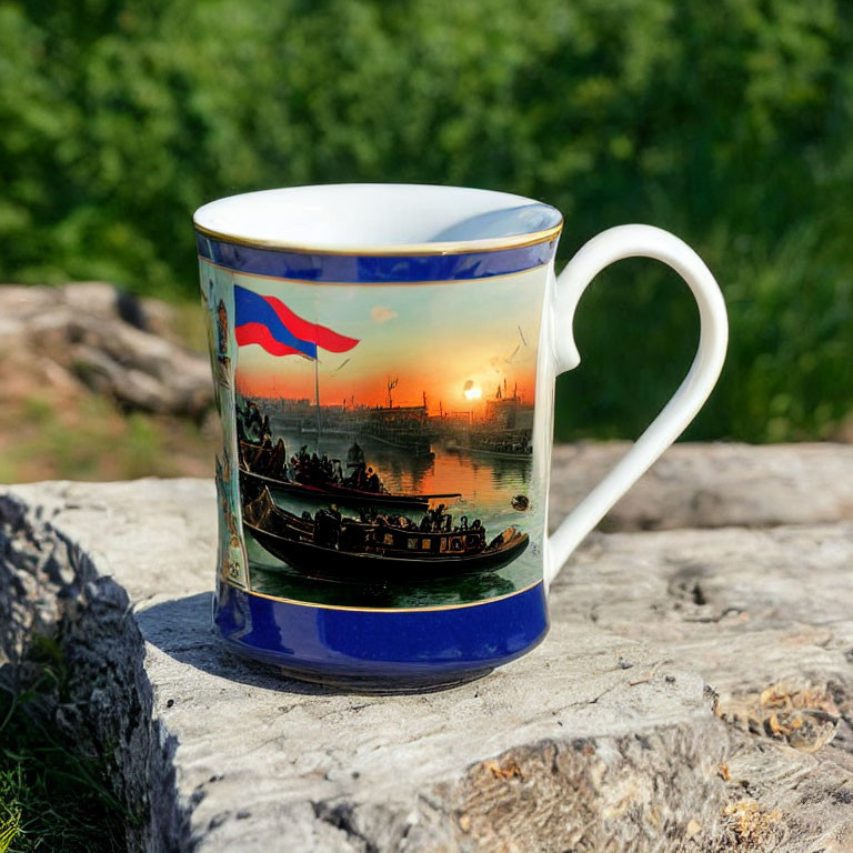 Historic boat scene print mug on rocky outdoor surface with lush greenery background