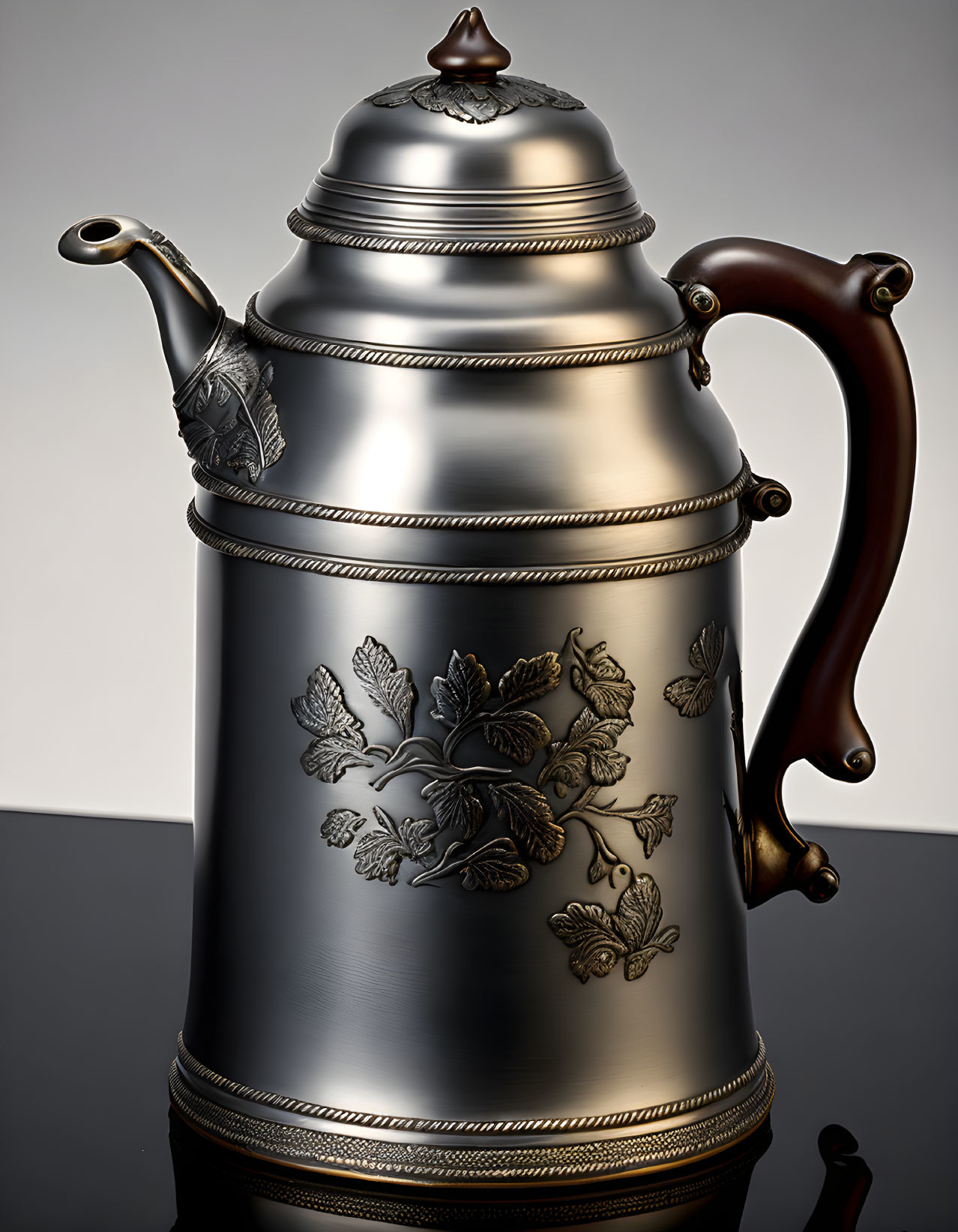 Embossed leaf motifs on metal teapot with gradient background