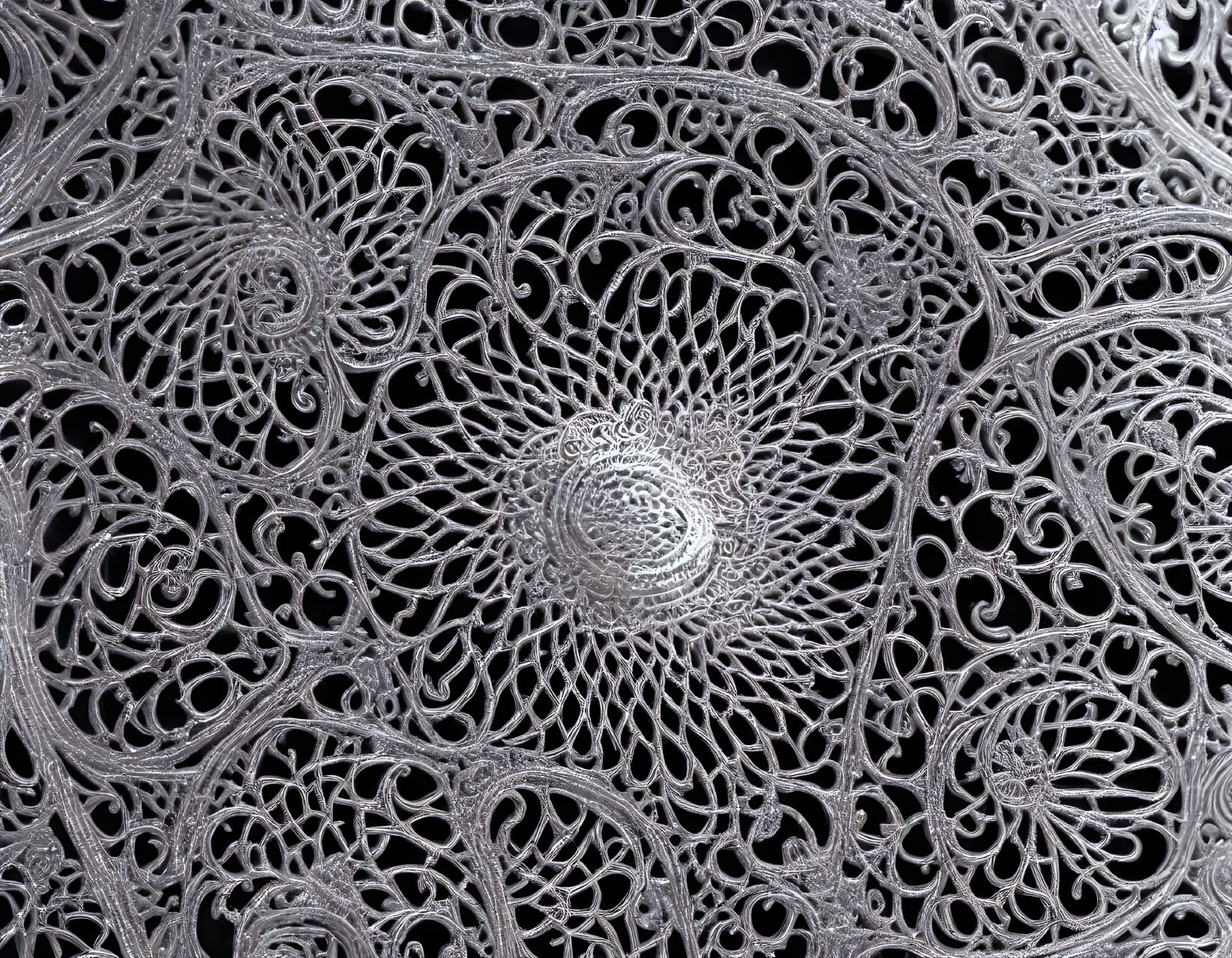 Symmetrical Spirals in Intricate Silver Filigree Pattern