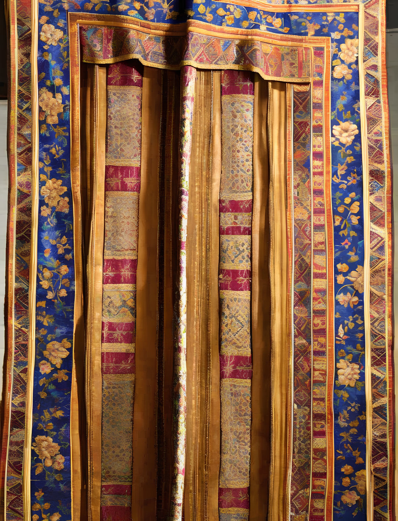 Intricate Gold, Red, and Blue Draped Curtains on Floral Backdrop