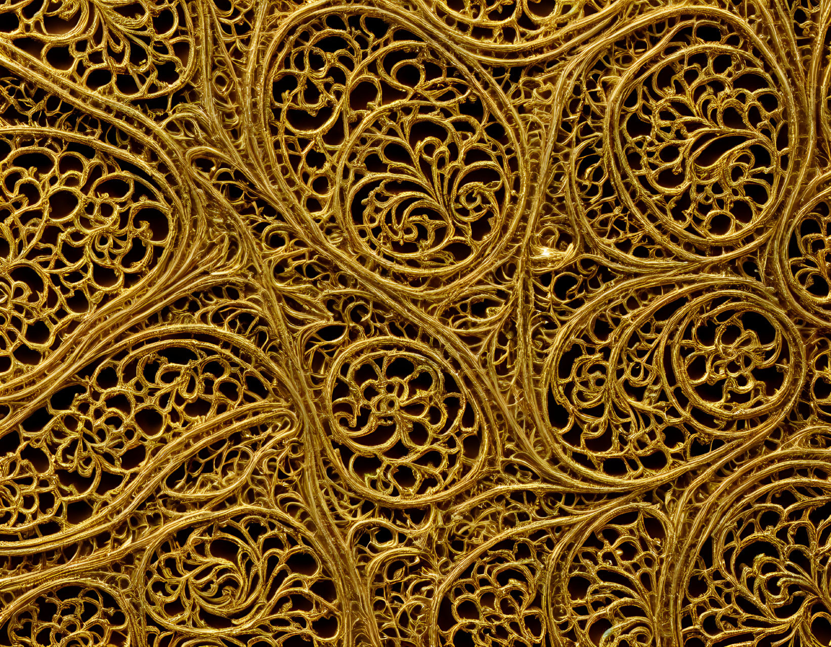 Detailed Golden Filigree Pattern with Swirls and Floral Designs