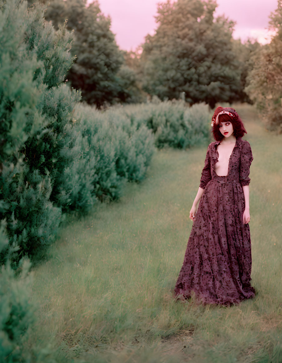 Vintage Dark Floral Dress Woman Standing in Garden Path