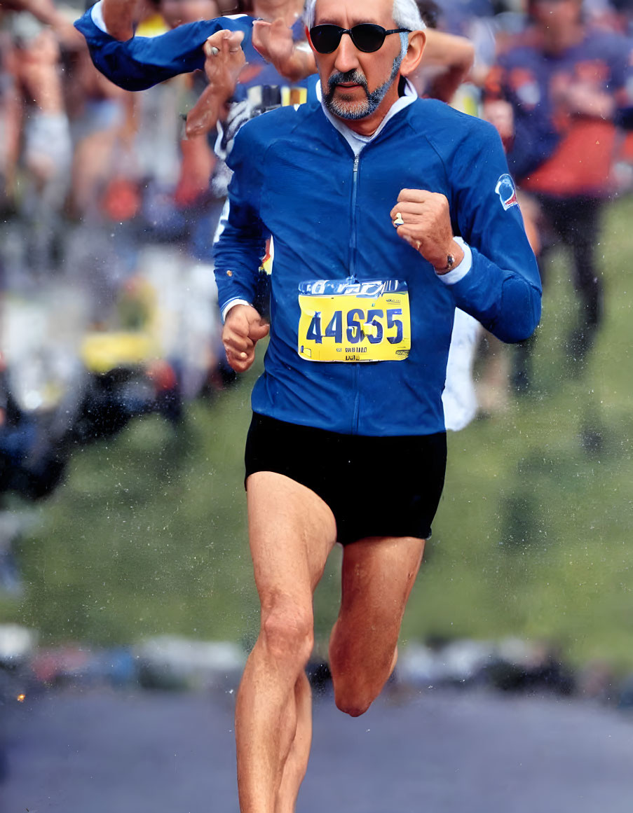 Elder Male Runner in Sunglasses and Beard at Marathon