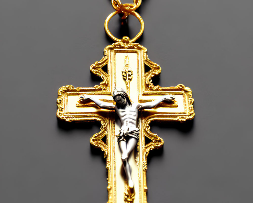 Detailed Jesus Figure on Gold Crucifix Pendant Hanging from Chain