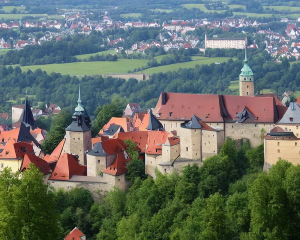 European Medieval Castle with Red Roofs Surrounded by Lush Greenery