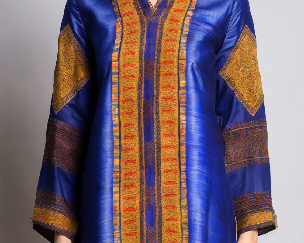 Blue Kurta with Golden and Red Patterns on Gray Background