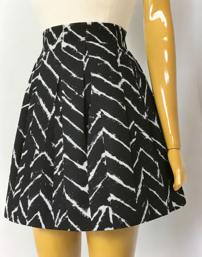 Black Flared Skirt with White Geometric Pattern on Mannequin