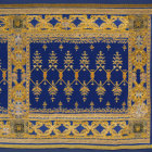 Blue Textile with Golden Plant Motifs and Decorative Border