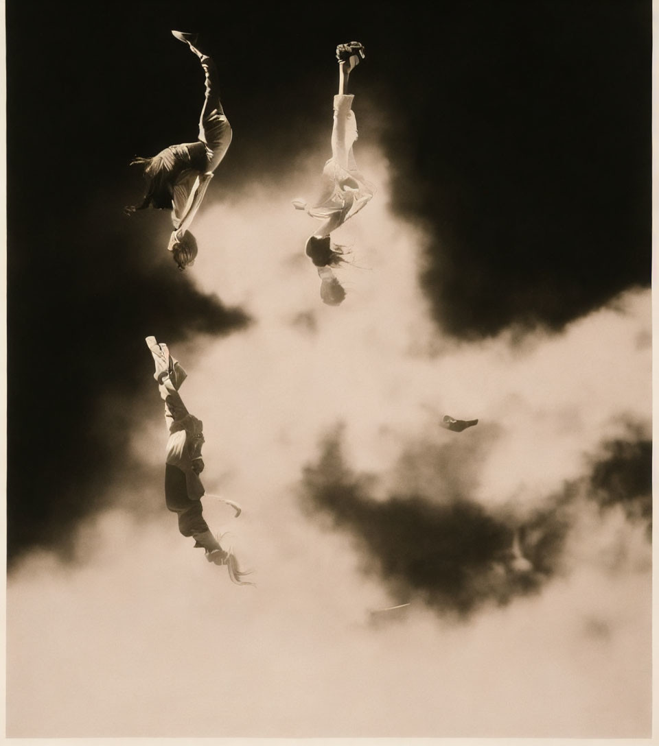 Sepia-toned image of three individuals floating above clouds