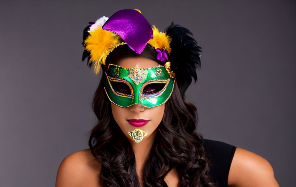 Colorful Feathered Mask and Purple Hat on Woman in Black Outfit