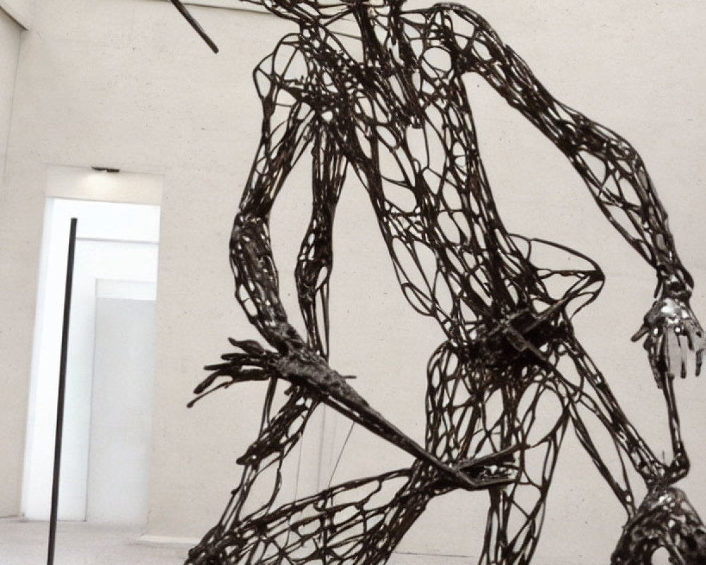 Abstract Metal Humanoid Figure Sculpture with Spear in White Gallery