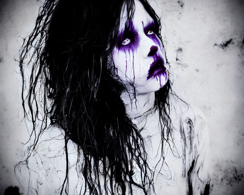 Dark Hair and Gothic Makeup with Purple Accents