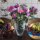 Colorful still life painting with vibrant flowers, glass jar, ornate bowls, lush foliage, and