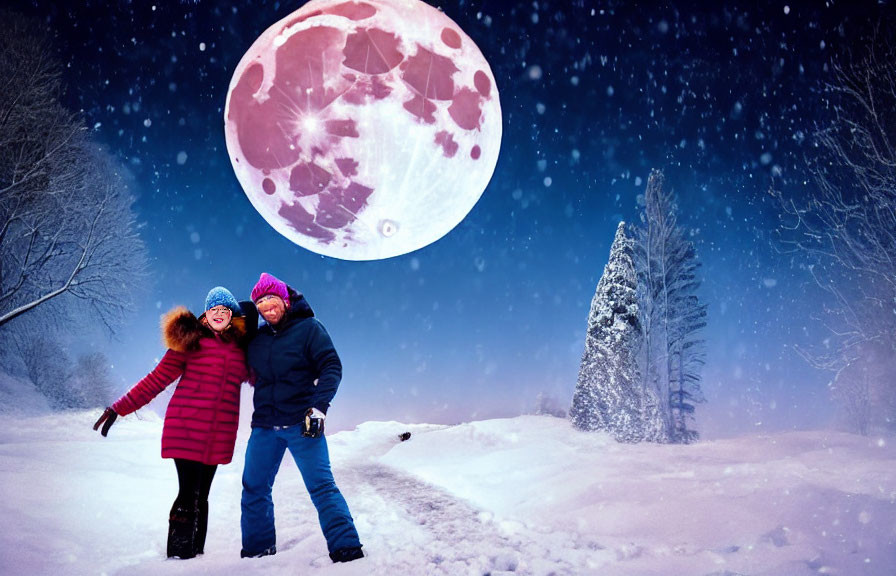 Two individuals in winter attire posing in snowy landscape under pink moon