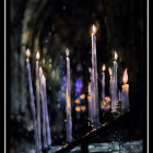 Gothic arch backdrop with lit candles and purple-orange bokeh