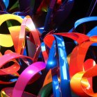 Colorful 3D illustration: Intertwined ribbons with glowing lights