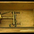 Intricate Grain Patterns on Wooden Box with Brass Handle