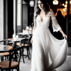 Woman in white lace dress twirls in elegant café