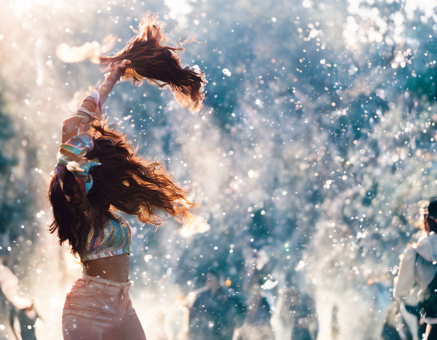 Woman dancing in sunlight with floating particles and people.