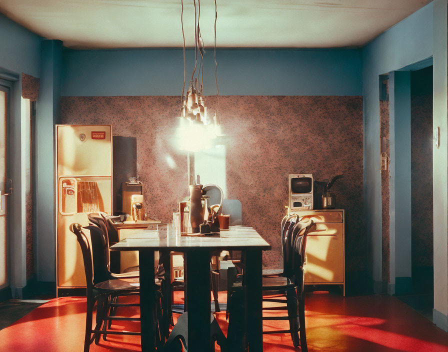 Classic Dining Room with Red Floor, Wooden Furniture, Chandelier, Vintage Appliances, and Patterned Wallpaper