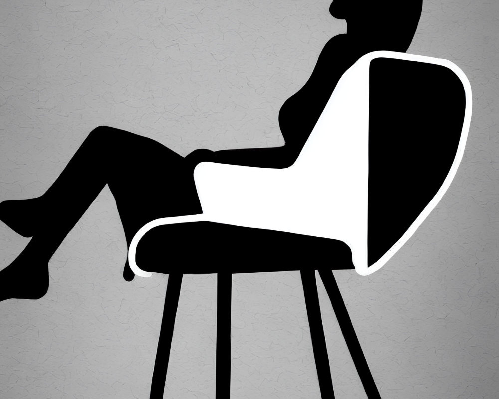 Silhouette of person lounging on chair against gray background