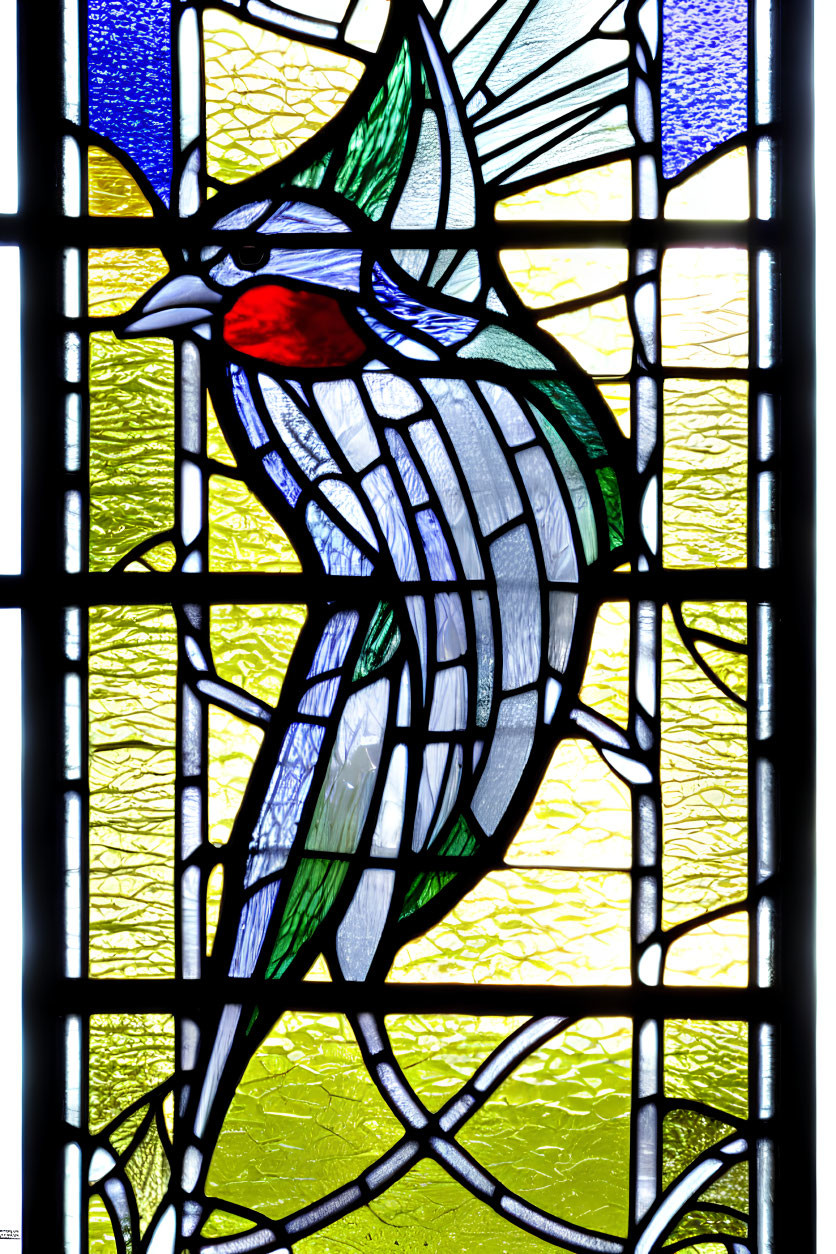 Colorful Bird Stained Glass Window with Red Detail on Yellow-Green Background