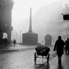 Snowy cityscape with silhouetted figures and gothic architecture