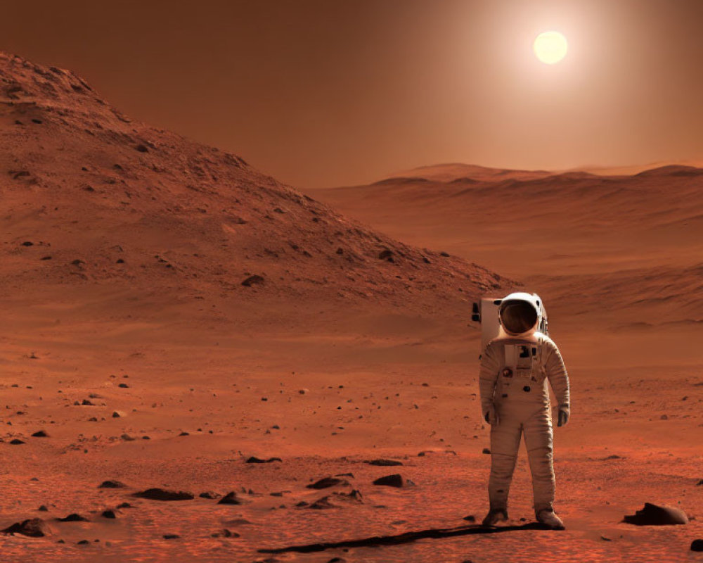 Astronaut on Mars surface with rocky hills and hazy sky