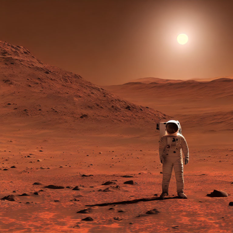 Astronaut on Mars surface with rocky hills and hazy sky