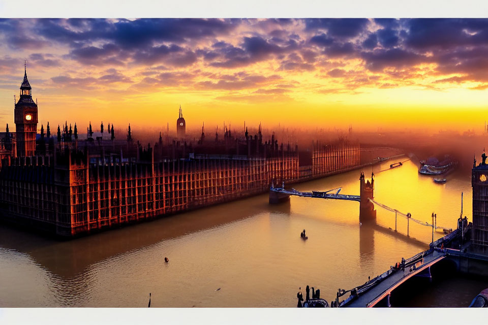 Golden sunset over River Thames with Houses of Parliament and Big Ben silhouettes in London.