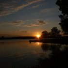 Tranquil Lake at Twilight with Moon and Stars