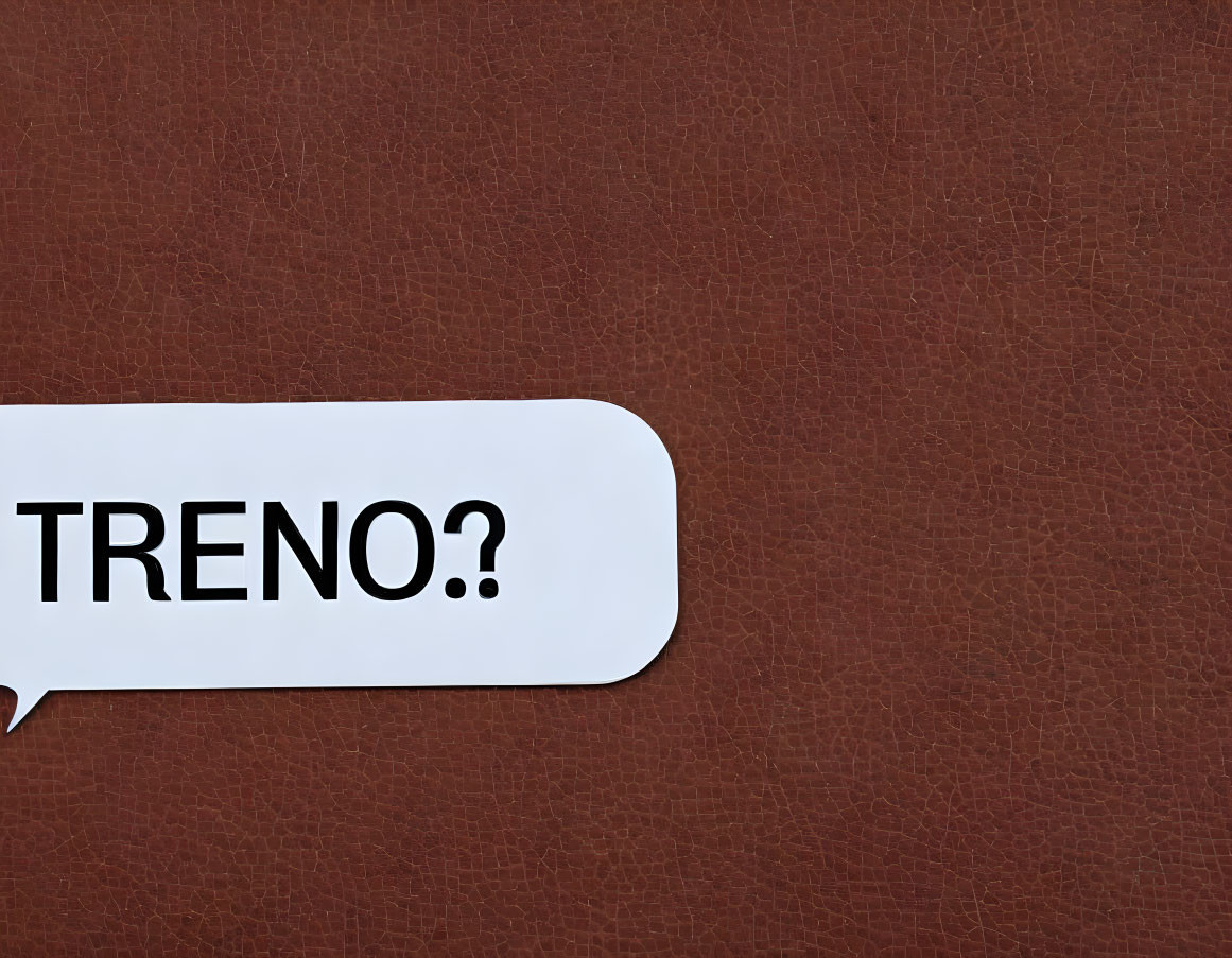 Speech Bubble with "TRENO?" on Textured Brown Background