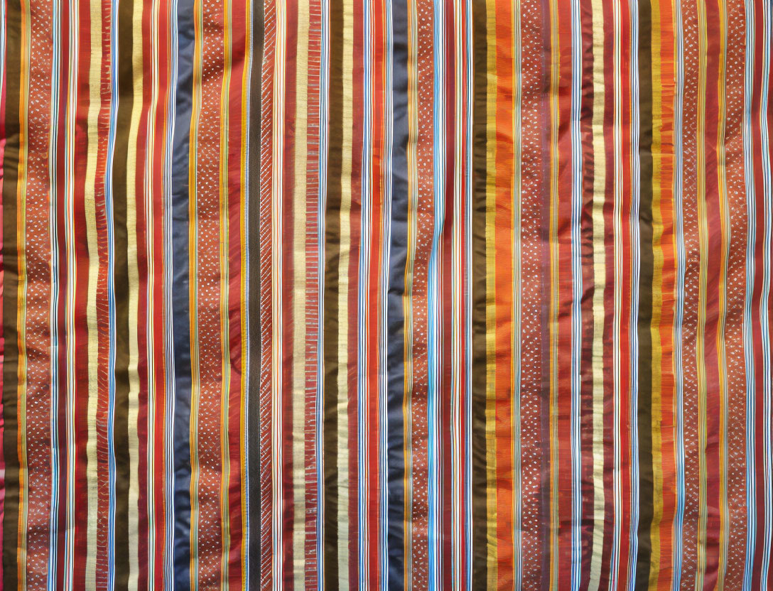 Colorful Striped Fabric with Red, Orange, White, and Blue Bands