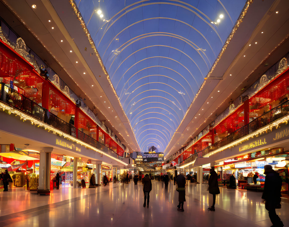 Festive indoor shopping mall with grand glass ceiling