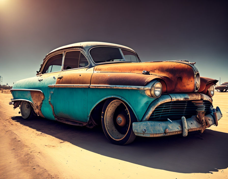 Vintage Turquoise and Rust Car in Desert with White Roof and Hazy Sky