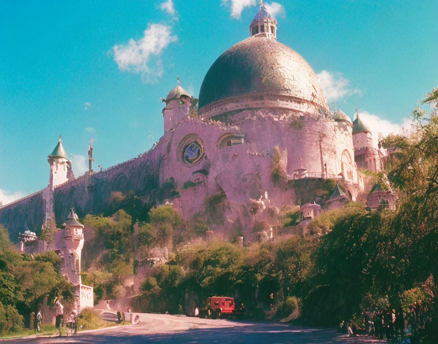 Majestic fairytale castle with dome and towers under blue sky surrounded by greenery and red