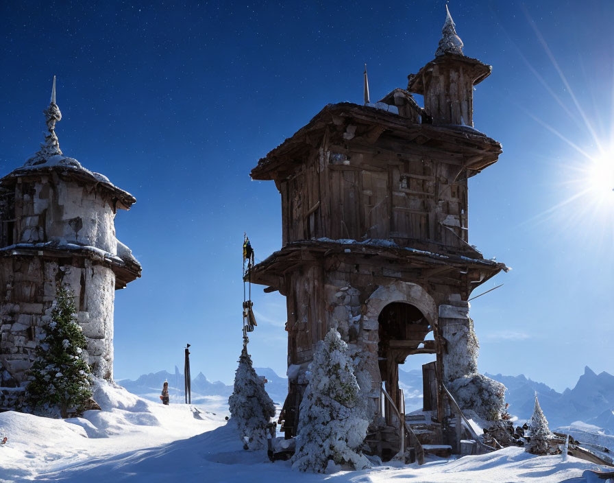 Winter scene with wooden towers, snowy landscape, person walking - serene and picturesque.