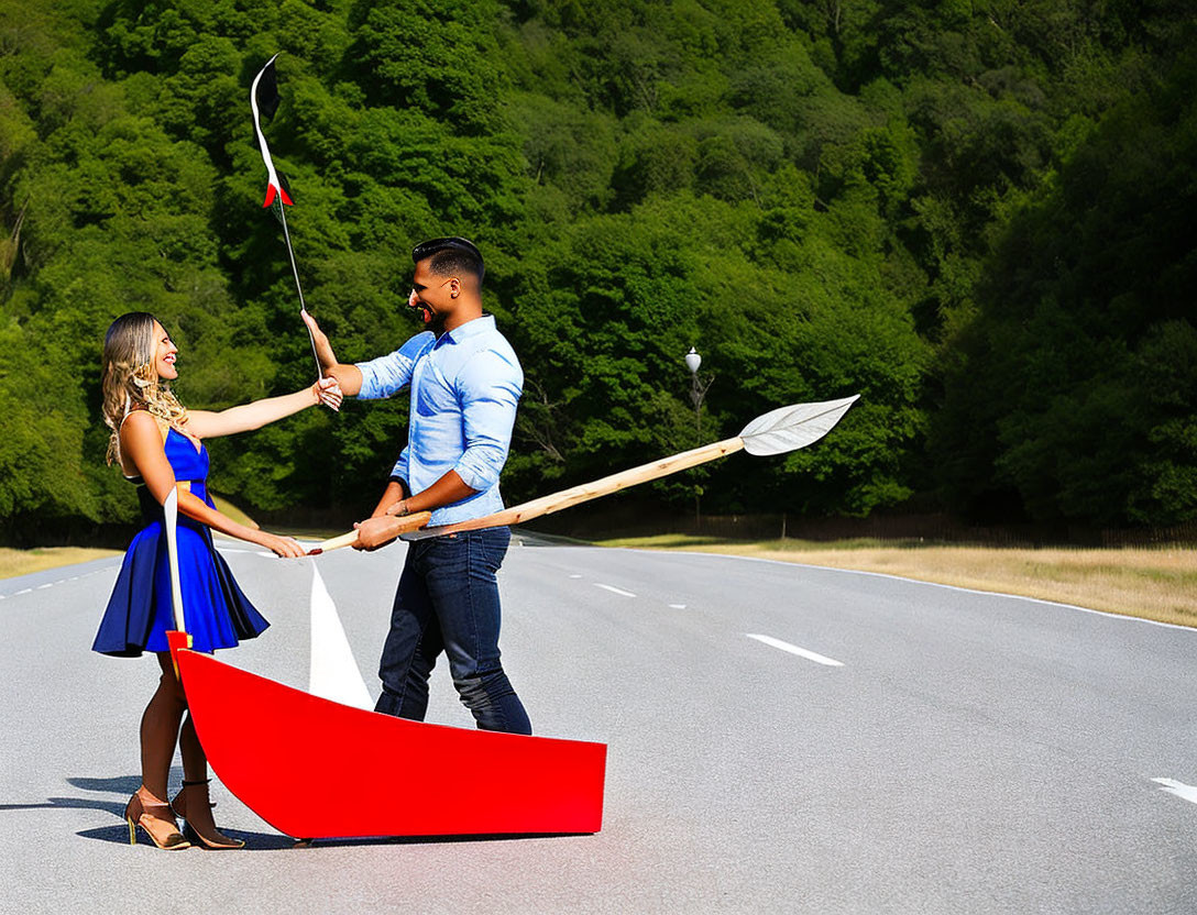 Couple with Giant Paintbrush on Road Creates Illusion of Canoe