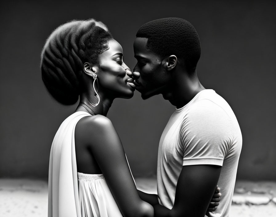 Intimate monochrome photo of man and woman close, noses touching