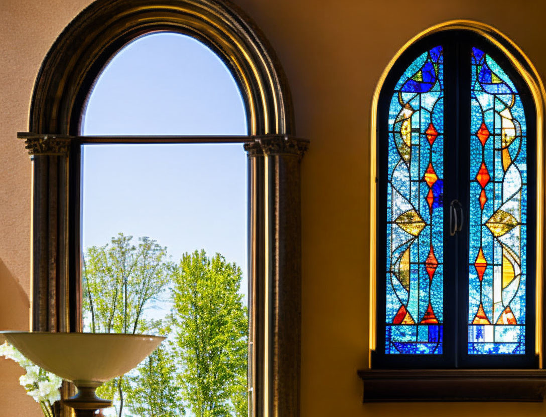 Arched and Stained-Glass Windows Contrasting Indoors and Outdoors