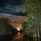 Tranquil forest lake at twilight with vibrant sunset reflections