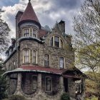 Victorian House with Ornate Trimmings in Misty Forest