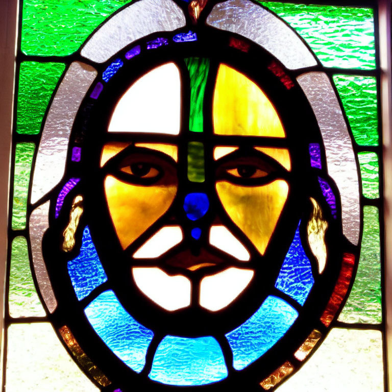 Abstract Human Face Stained Glass Window with Geometric Shapes and Vibrant Colors