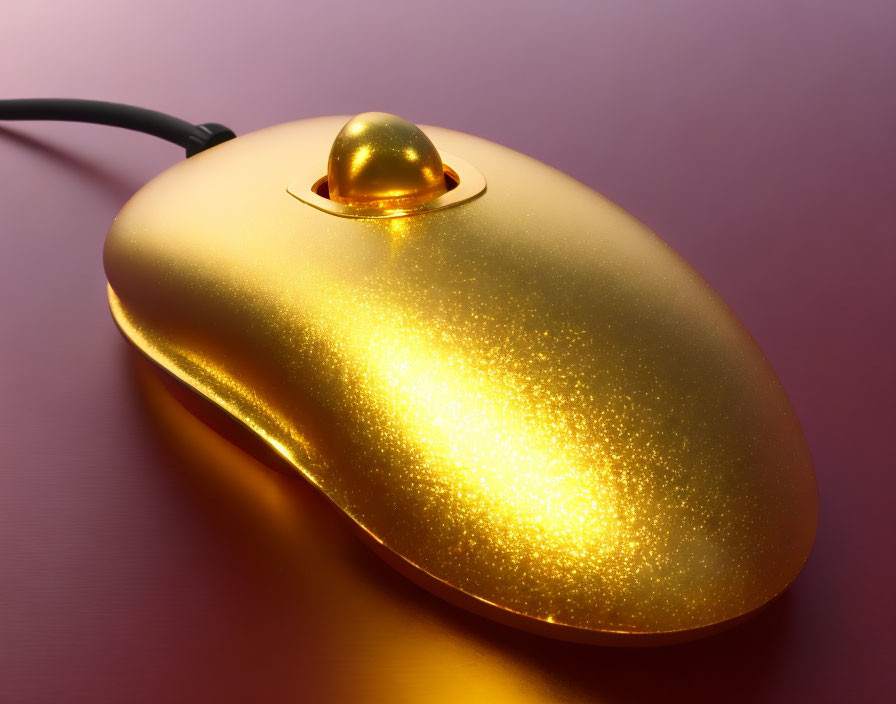 Shiny golden computer mouse on pink gradient background