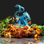 Colorful Blue Dragon Surrounded by Flowers and Stars