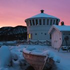 Classical Pavilion on Rocky Hill at Dusk with Cosmic Clouds